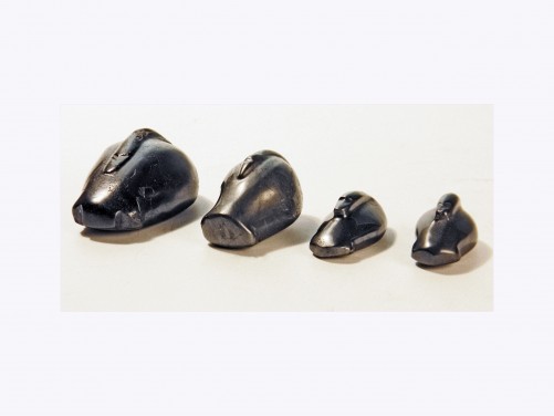 Four Hematite Duck Weights